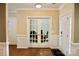 Spacious foyer featuring hardwood floors and entry to office at 13127 Centennial Commons Pkwy, Huntersville, NC 28078