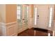 Elegant foyer with hardwood floors and paneled walls at 13127 Centennial Commons Pkwy, Huntersville, NC 28078