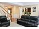 Comfortable living room with hardwood floors and a staircase at 13127 Centennial Commons Pkwy, Huntersville, NC 28078