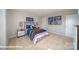 Stylized bedroom features comfortable bed, stylish decor, and neutral-toned carpet at 133 Calvin Creek Dr, Troutman, NC 28166