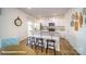 Stylish kitchen with granite countertops, stainless steel appliances, and a breakfast bar with seating at 133 Calvin Creek Dr, Troutman, NC 28166