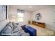 Cozy living room featuring stylish decor, comfortable seating, and lots of natural light at 133 Calvin Creek Dr, Troutman, NC 28166