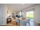 Cozy living area with a fireplace, comfortable seating, and a sliding door to the outdoors at 133 Calvin Creek Dr, Troutman, NC 28166
