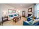 Bright living room featuring a fireplace, modern decor, and comfortable seating at 133 Calvin Creek Dr, Troutman, NC 28166