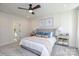 Bedroom with white shiplap walls, plush carpeting, and matching bedside tables at 2011 Mantle Ridge Dr # 193, Wesley Chapel, NC 28079