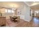 Charming dining room with a wooden table and decorative chandelier at 2011 Mantle Ridge Dr # 193, Wesley Chapel, NC 28079