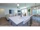 Kitchen island with a view of the living and dining areas at 2011 Mantle Ridge Dr # 193, Wesley Chapel, NC 28079