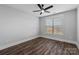 A bedroom featuring modern ceiling fan, window, and wood-look flooring at 2063 Fordhill St, Rock Hill, SC 29732