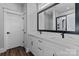 Bathroom with double vanity featuring quartz countertops and large mirror at 2078 Fordhill St, Rock Hill, SC 29732