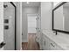 Modern bathroom featuring walk-in shower with black fixtures, quartz counters and access to the walk-in closet at 2078 Fordhill St, Rock Hill, SC 29732