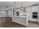 Modern kitchen featuring stainless steel appliances, an island, and contemporary lighting at 2078 Fordhill St, Rock Hill, SC 29732