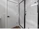 Modern walk-in shower featuring large white tiles and glass surround at 2078 Fordhill St, Rock Hill, SC 29732