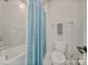 Clean bathroom with a tiled shower, a toilet, and a shower curtain, perfect for daily use at 6398 Chimney Bluff Rd, Lancaster, SC 29720
