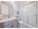 Modern bathroom with glass shower, tile flooring, and contemporary vanity at 6398 Chimney Bluff Rd, Lancaster, SC 29720