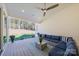 Relaxing covered patio with comfortable seating, outdoor furniture and view of wooded backyard at 6398 Chimney Bluff Rd, Lancaster, SC 29720