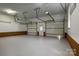Spacious two-car garage with multiple doors and ample room for storage at 7146 Sifford Rd, Stanley, NC 28164