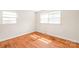 Bedroom with hardwood floors with natural light at 7207 Idlewild Rd, Charlotte, NC 28212