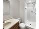 Bathroom featuring a walk-in shower with tile and a modern vanity at 11712 Battery Pl, Charlotte, NC 28273