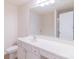 Bright bathroom with large mirror, white vanity, and a toilet at 2009 Amos Oaks Ln, Charlotte, NC 28215