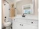 Bathroom featuring white cabinets, subway tile, and modern fixtures at 2017 Belle Grove Dr, Waxhaw, NC 28173