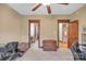 A spacious bedroom showcases wood trim, neutral carpet, and multiple doorways at 298 Poplar Grove Ct, Taylorsville, NC 28681