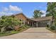 Inviting home with stone accents, manicured landscaping, and a spacious driveway at 298 Poplar Grove Ct, Taylorsville, NC 28681