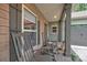 Cozy front porch featuring rocking chairs and a welcoming atmosphere at 298 Poplar Grove Ct, Taylorsville, NC 28681