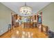 Spacious open-concept kitchen with stainless steel appliances, wood floors, and a large central island with seating at 298 Poplar Grove Ct, Taylorsville, NC 28681