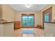 Sunlit living room showcasing wood floors, a large window with mountain views, and natural wood trim at 298 Poplar Grove Ct, Taylorsville, NC 28681