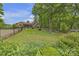 Well-maintained yard with lush greenery surrounding the property at 298 Poplar Grove Ct, Taylorsville, NC 28681