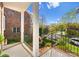 View from the balcony that overlooks the backyard and neighborhood street at 415 Spring St, Davidson, NC 28036