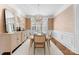 Inviting dining room with natural light, a stylish chandelier, and a neutral color palette at 415 Spring St, Davidson, NC 28036