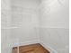 Spacious walk-in closet with built-in shelving, providing ample storage space for clothing and accessories at 415 Spring St, Davidson, NC 28036