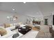 Spacious finished basement with a large sectional sofa and pool table at 6004 Clover Hill Rd, Indian Trail, NC 28079