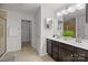 Bright bathroom with double sinks, granite countertops, and a glass-enclosed shower offers a spa-like experience at 6004 Clover Hill Rd, Indian Trail, NC 28079