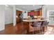 Open kitchen with granite island, stainless appliances, and a breakfast bar perfect for entertaining at 6004 Clover Hill Rd, Indian Trail, NC 28079