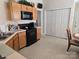 Functional kitchen with essential appliances, lots of cabinet space and an adjacent eating area at 8411 Rhian Brook Ln, Charlotte, NC 28216