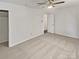 Spacious carpeted bedroom featuring a closet and neutral color scheme at 10707 Copper Field Dr, Pineville, NC 28134