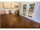 Well-equipped kitchen with stainless steel appliances and access to a bright outdoor deck at 10707 Copper Field Dr, Pineville, NC 28134
