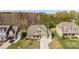 An eye-level shot showcases this attractive home with a spacious yard and three-car garage at 11037 Thornbeck Ln, Midland, NC 28107