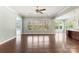 Bright living room with hardwood floors and large windows at 11037 Thornbeck Ln, Midland, NC 28107