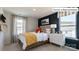 Cozy bedroom with bright decor, large windows, and neutral walls at 2048 Harlequin Dr, Indian Trail, NC 28079