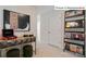 Stylishly decorated hallway featuring a record player, modern console table and trendy record storage at 2048 Harlequin Dr, Indian Trail, NC 28079