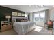Relaxing main bedroom featuring lots of natural light, neutral walls and soft carpet at 2048 Harlequin Dr, Indian Trail, NC 28079