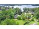 Picturesque aerial view of a home surrounded by lush trees near the water at 3004 Vernell Ln, Shelby, NC 28150