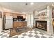 Finished basement with kitchenette, fireplace, and unique tile flooring, ideal for entertaining at 3004 Vernell Ln, Shelby, NC 28150
