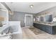 A spacious bathroom features a separate tub, shower, double vanity, and a chandelier at 3004 Vernell Ln, Shelby, NC 28150