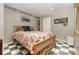 Cozy bedroom with patterned bedding, checkered floors, and ample storage space for comfortable living at 3004 Vernell Ln, Shelby, NC 28150