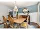 Elegant dining room with wainscoting, chandelier, and hardwood floors at 3004 Vernell Ln, Shelby, NC 28150