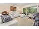 Bright living room featuring plush seating, modern decor, and sliding glass doors to the outdoors at 3004 Vernell Ln, Shelby, NC 28150